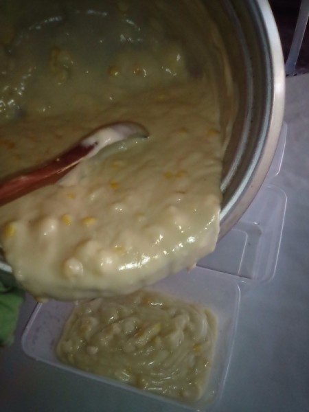 pouring pudding into small containers