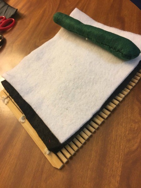 Sushi Plush Toy - place green tube on top of white and black felt