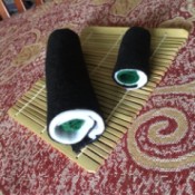 Sushi Plush Toy - two sushi rolls on mat
