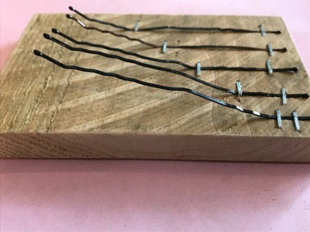 Bobby Pin Thumb Piano - view the longer end pin