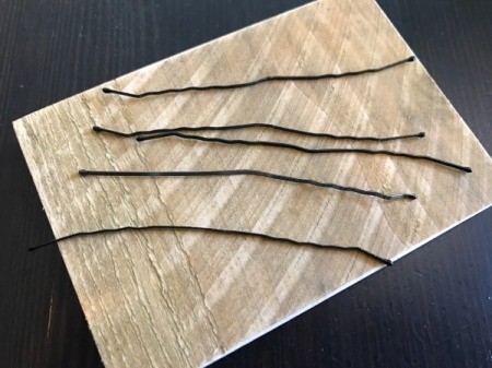 Bobby Pin Thumb Piano - straighten out the bobby pins