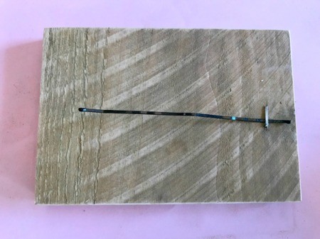 Bobby Pin Thumb Piano - bobby pin stapled to edge of wood