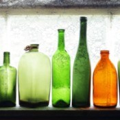 A row of old glass bottles.