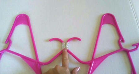 Clothes Hangers Wall Decoration - taping closeup