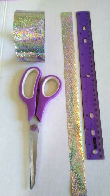 Clothes Hangers Wall Decoration - cut strips of duct tape