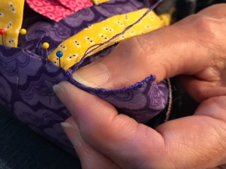 Fabric Chicken Doorstop - closeup of sewing bottom shut