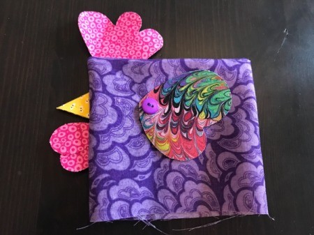 Fabric Chicken Doorstop - side view of chicken with wing attached