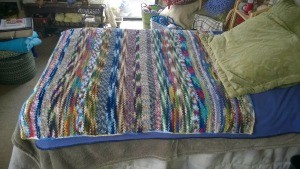 Recycled Yarn Afghan - side view of day bed with afghan