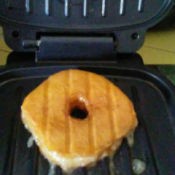 A freshly grilled glazed doughnut.