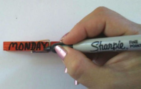 Weekday Clothespins - use a different color marker to write the day of the week