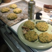 Caulitater Burger patties on plate and baking sheet