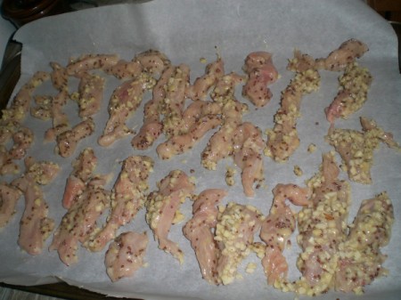 Honey Almond Chicken Strips on baking paper