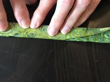 Clothespin Apron - finger press the seam along the center line