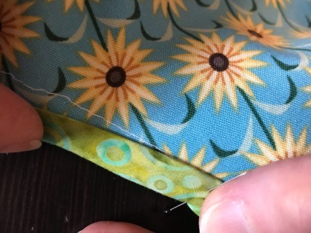 Clothespin Apron - cover the initial seam line when turning