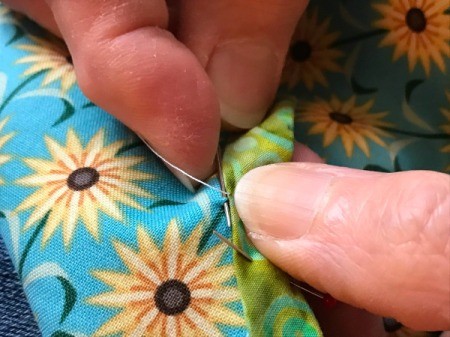 Clothespin Apron - blind stitching the binding on the inside of pocket