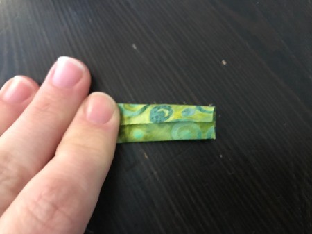 Clothespin Apron - fold the sides in to the center and then fold in half