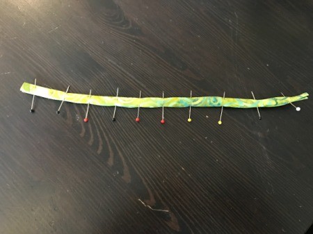 Clothespin Apron - pin along the entire length in preparation for sewing