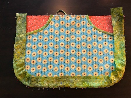 Clothespin Apron - bias binding pinned to apron by removing pins and resetting