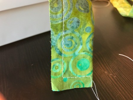 Clothespin Apron - view of tie seam and turn to close ends