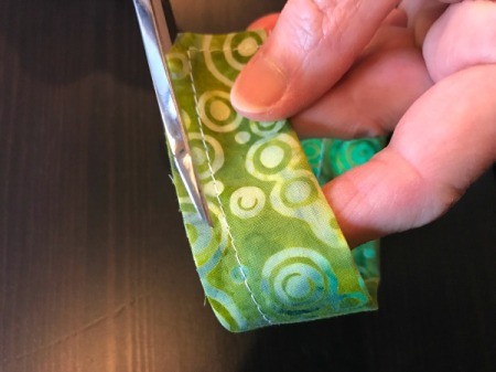 Clothespin Apron - trimming excess fabric on long seam