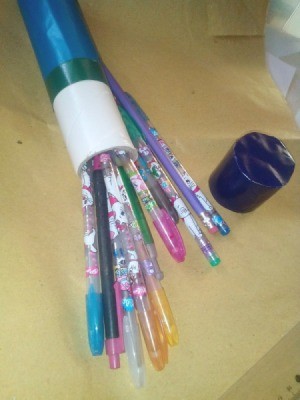 Cling Wrap Roll as Pencil Case - pencil case with spilled pens and pencils