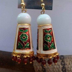 A pair of handcrafted earrings.