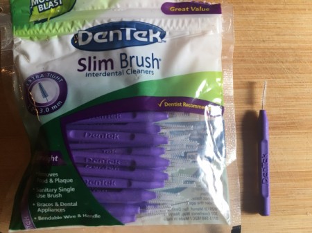 A package of interdental brushes.
