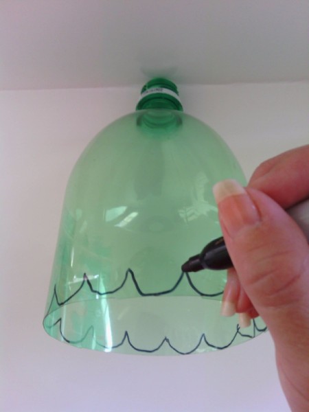 Soda Bottle Bird Feeder - draw decorative edge on top with Sharpie
