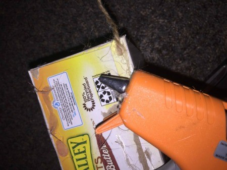 Fabric Covered Recycled Box - attach the jute cord with a dot of glue, begin wrapping