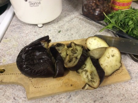 cutting the baked Eggplant