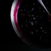 Blueberry compote in an aluminum pot.
