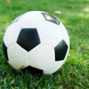 A soccer ball on grass.