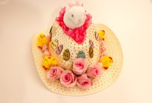 A straw cowboy hat with Easter decorations.