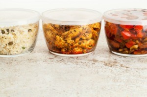 Leftovers stored in clear containers with lids.