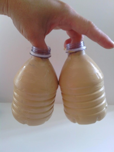 Sumo Wrestler Salt and Pepper Shakers - two tan bottles