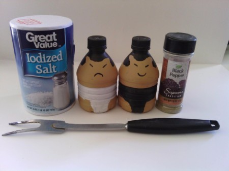 Sumo Wrestler Salt and Pepper Shakers - salt and pepper shakers and fork along with pepper and salt