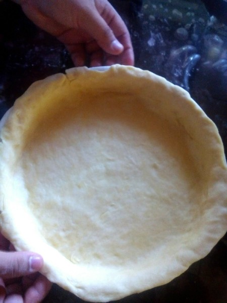 Biko Pie dough filling bottom of pan