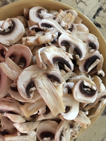 Mushrooms sliced in bowl