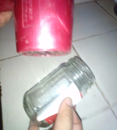 A label being pulled up after a hair dryer is used on it.