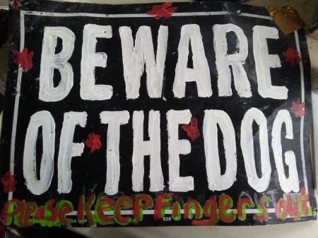 A repainted "Beware of the Dog" sign.