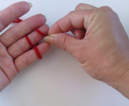 Finger Knit Headband - binding off