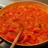 A pan of tomato sauce for spaghetti.