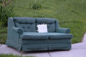 A free couch on the side of the road.