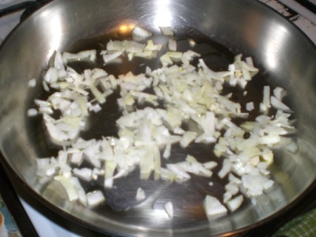 chopped onions and garlic in pan