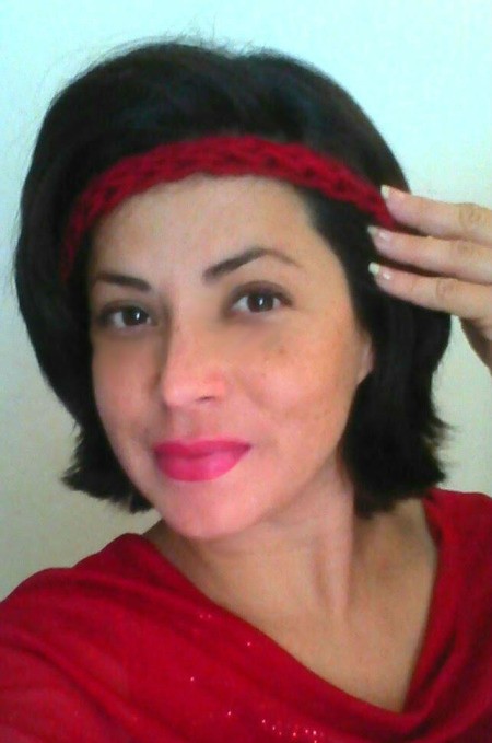 Finger Knit Headband - knitter wearing the headband