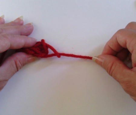 Finger Knit Headband - pull tail tight