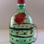 Recycled Soda Bottle Cup - finished lidded cup with ladybug motif