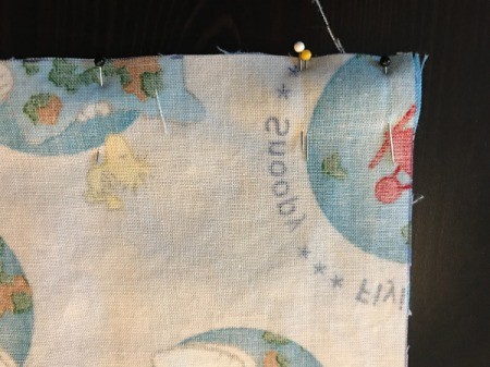 Book Pocket Pillow - place second pillow square on top of the pocket and pillow piece, right sides together, pin alone bottom only