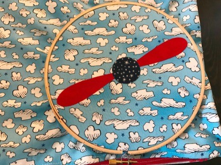 Book Pocket Pillow - Center the propeller in a small embroidery hoop.