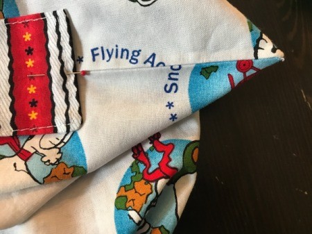 Book Pocket Pillow - The handle is centered over the top seam.